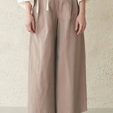 Schichtige Seidenbluse mit Schlitz am Ausschnitt und Ärmeln