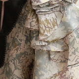 Layered sleeve slit-neck silk blouse