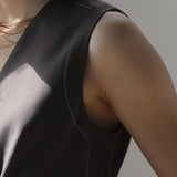 Sleeveless asymmetric jacket