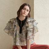 Layered sleeve slit-neck silk blouse