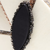 Subtlety feast brooch onyx - fasfas