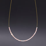 Invisible 2mm pink coral necklace - fasfas