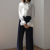 Blouse en dentelle à ruban col en V