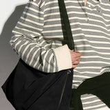 Borsa hobo in pelle di mucca con tracolla nera
