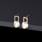 Mother of pearl void cubic earrings - fasfas