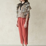 Layered sleeve slit-neck silk blouse