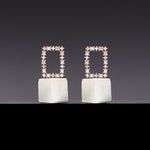 Mother of pearl void cubic earrings - fasfas