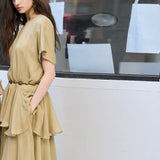 Vestido longo de seda com franzidos assimétricos e corte solto