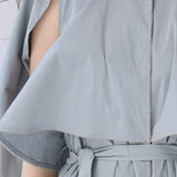 Cutout cape sleeve asymmetric trench coat lavender gray - fasfas