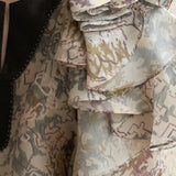 Layered sleeve slit-neck silk blouse