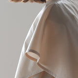 Bauchfreies Wickelbluse mit Puffärmeln