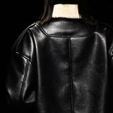 Black signature faux shearling coat