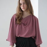 Blouse ample à col drapé