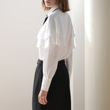 Side unbalanced black H-line skirt