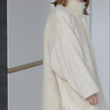 High-neck oversized shearling coat