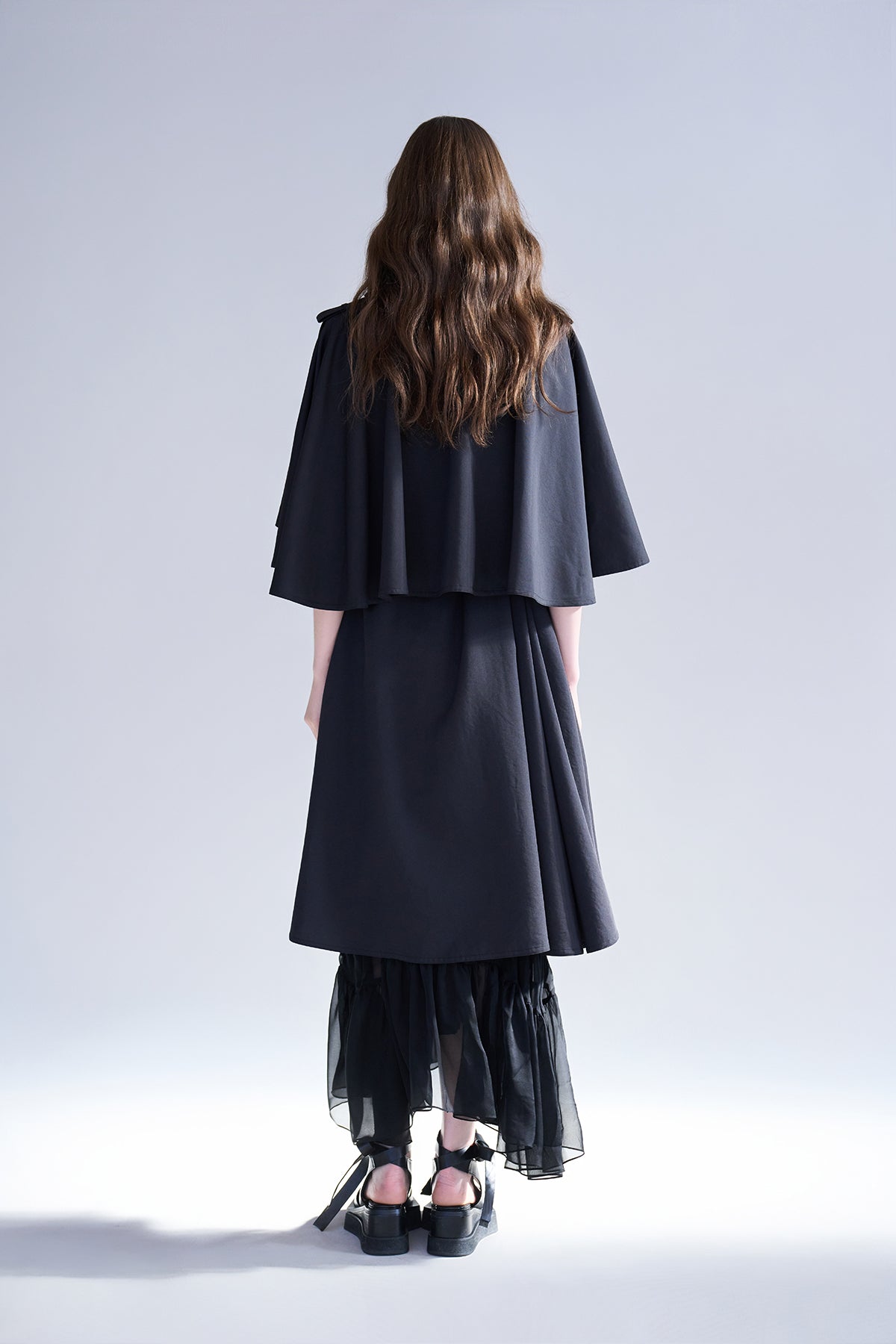 Loose fit cutout cape sleeve asymmetric trench coat black - fasfas