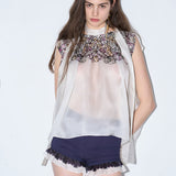 Paisley print sleeveless tie silk blouse