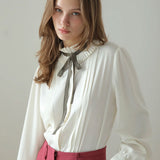 Blus reben lipatan jarum berlipat