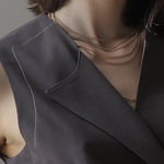 Sleeveless asymmetric jacket - fasfas