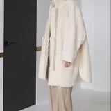 High-neck oversized shearling coat
