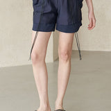 Schichtige Seidenbluse mit Schlitz am Ausschnitt und Ärmeln