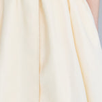 Cutout cape sleeve asymmetric silk trench coat vanila - fasfas