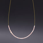 Invisible 2mm pink coral necklace - fasfas